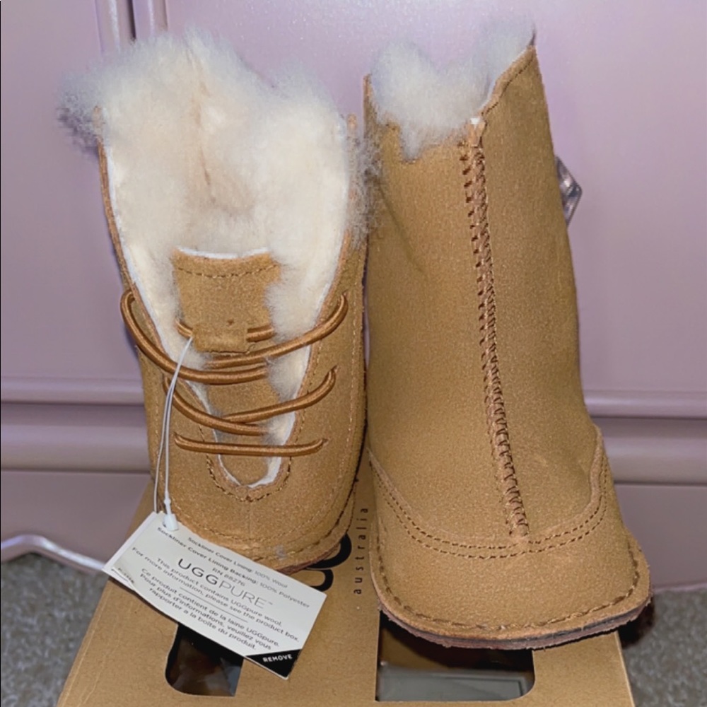 Brand new never been worn infant chestnut uggs.